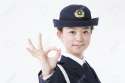 47152630-Women-police-officers-make-the-OK-sign-Stock-Photo.jpg