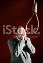 stock-photo-14167119-man-in-front-of-noose-covers-his-face-with-hands.jpg