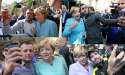 Merkel-Migrant-Selfies.jpg