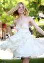 34F9327100000578-3627459-Pretty_in_white_On_Monday_Elle_Fanning_dazzled_in_a_white_chiffo-m-104_1465218699272.jpg