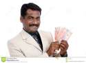 indian-business-man-money-21370164.jpg