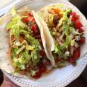 Slow cooked shredded chicken tacos with onions, peppers, lettuce and pico de gallo.jpg