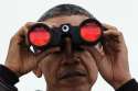 us-president-barack-obama-looks-through-binoculars-towards-north-korea-from-observation-post-ouellette-in-south-korea-772222.jpg