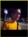 asian plays pokemon go in nyc at night.gif