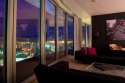 Staying Cool Serviced Apartments Birmingham Penthouse lounge and view at night.jpg