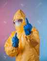 34562249-Scientist-with-protective-yellow-hazmat-suit--Stock-Photo.jpg