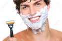 5643006-Laughing-man-s-face-with-shaving-cream-on-it-and-razor-near-the-face-Stock-Photo.jpg