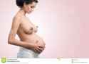 beautiful-figure-young-pregnant-woman-bare-breasts-29855961.jpg