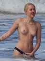 Miley-Cyrus-Topless-in-Hawaii-Ocean-04-830x1107.jpg