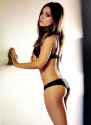 Mila-Kunis-posed-black-lingerie-Novermber-2012-issue.jpg
