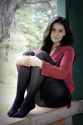 Girl_in_red_shirt_and_black_tights.jpg
