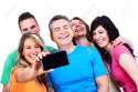 13541720-Group-of-happy-people-with-a-smartphone--Stock-Photo-phone-family-cell.jpg