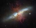 M82, the Cigar Galaxy. In 2010, a strange radio signal, unlike any other in the universe was picked up from the direction of M82. Its origin remains a mystery.jpg