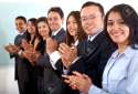 3189981-business-team-clapping-a-good-presentation-in-an-office-Stock-Photo.jpg