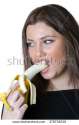 stock-photo-cute-brunette-lady-wear-black-shirt-holding-and-eating-a-peeled-banana-379738510.jpg