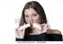 stock-photo-cute-brunette-lady-wear-black-shirt-holding-and-split-a-banana-front-of-her-face-379738486.jpg