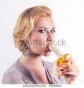 stock-photo-young-sexy-blond-woman-eating-peeled-banana-isolated-on-white-background-275082548.jpg