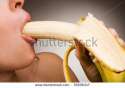 stock-photo-young-woman-eating-banana-in-own-sexy-style-35006347.jpg