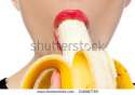 stock-photo-fgagment-female-face-with-a-banana-close-up-230987785.jpg