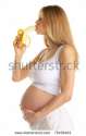 stock-photo-pregnant-woman-is-sexually-bites-banana-isolated-on-white-75159403.jpg