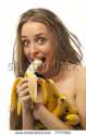 stock-photo-young-amazed-woman-eating-banana-over-white-background-77777563.jpg
