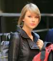 taylor-swift-in-leather-jacket-stepping-out-of-her-apartmen-in-new-york-city_1.jpg