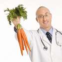 13146_stock-photo-doctor-holding-carrots.jpg