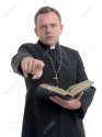 27516953-Catholic-priest-preaching-holding-open-the-Bible-book-shot-on-white-Stock-Photo.jpg