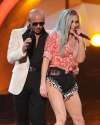Pitbull-and-Keha-perform-onstage-during-the-2013-American-Music-Awards.jpg