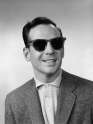 1950s-1960s-portrait-of-blind-man-wearing-sports-jacket-shirt-and-very-dark-protective-sunglasses.jpg