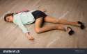 stock_photo_crime_scene_simulation_college_girl_lying_on_the_floor_137452910.jpg