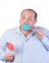 15211168-Fat-Man-in-a-Blue-Shirt-Eating-a-Lollipop-isolated-Stock-Photo.jpg