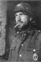 german soldier smokes cigarette in Stalingrad.png