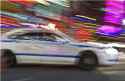 Police-car-moving-fast.jpg