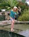 Hilary Duff-barefoot in fountain.jpg
